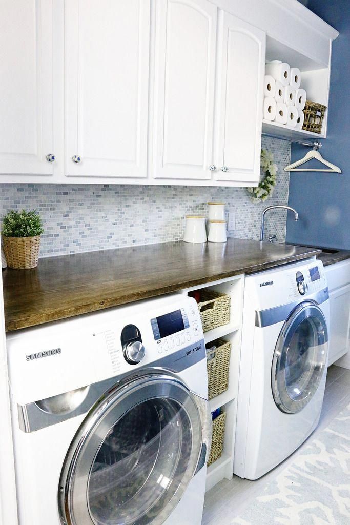 Love the countertop over the washer/ dryer (removable to