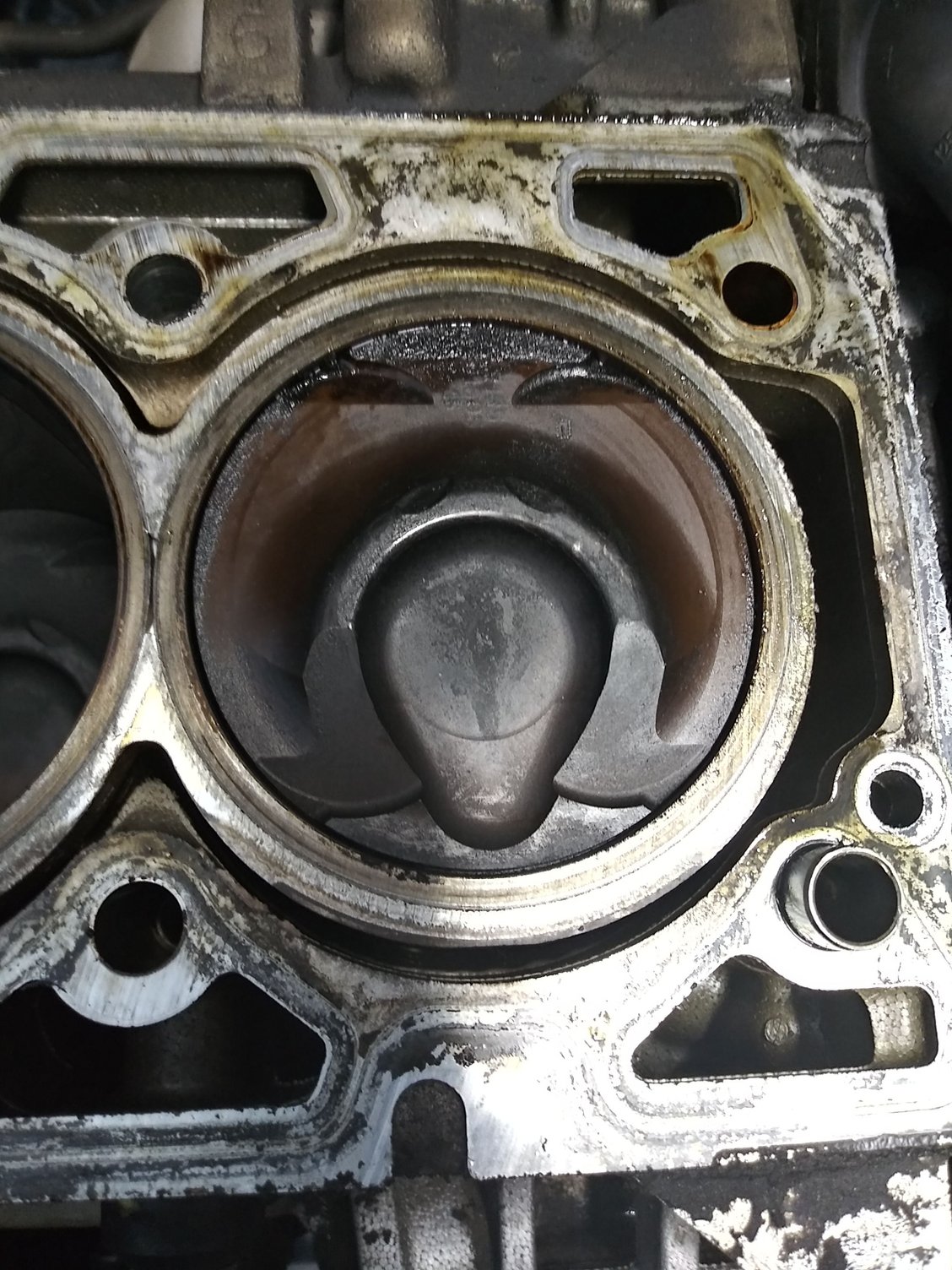 Does this head gasket look like it was leaking near no 1