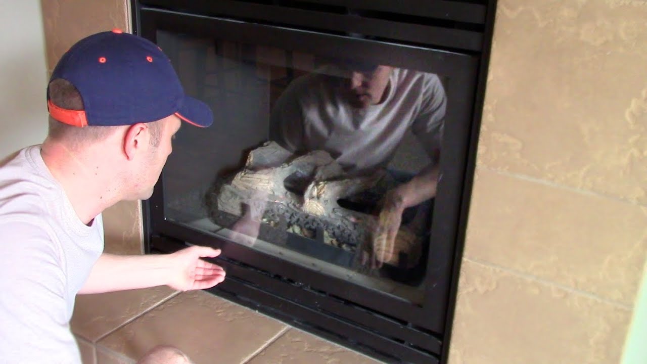 How open & remove to clean the glass cover on a GAS
