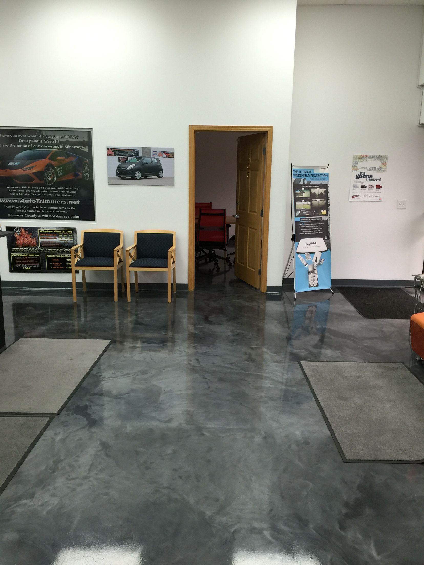 Metallic Epoxy floor coating installed for a print shop by