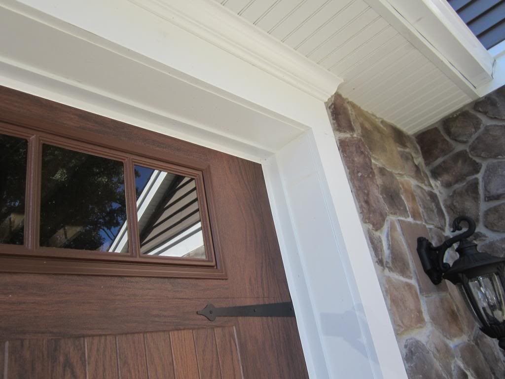 Construction guys....how to trim out a garage door